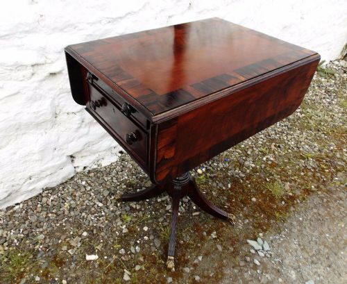 fig 1. Fine Georgian mahogany and rosewood pedistal pembroke table
