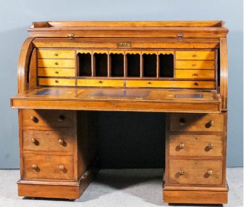 A Fine Victorian Light Oak Pedestal Cylinder Desk Fitted