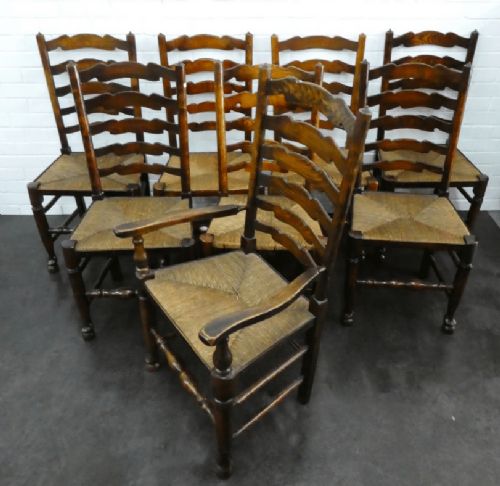 A Good Set of Eight Oak Victorian Lancashire Ladderback Dining Chairs with Double Stretchers.