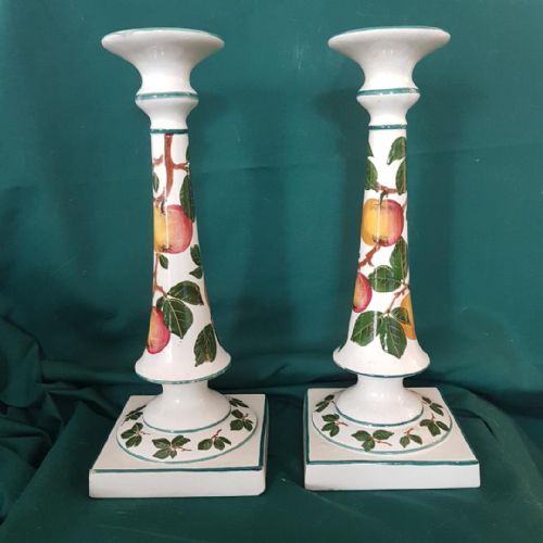 A Large Pair of Wemyss Ware Candlesticks Decorated with Apples