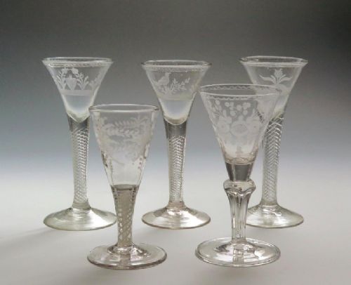 Five Finely Engraved Airtwist Wine Glasses Mid 18th Century,