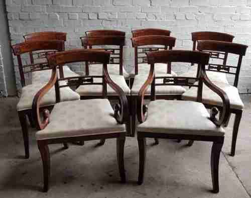 A Superb Set of 10 Regency Period Mahogany Sabre Leg Chairs Incl; Two Carvers