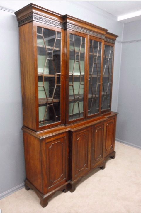 A Victorian Cottage Library Four Door Mahogany Breakfront Bookcase.