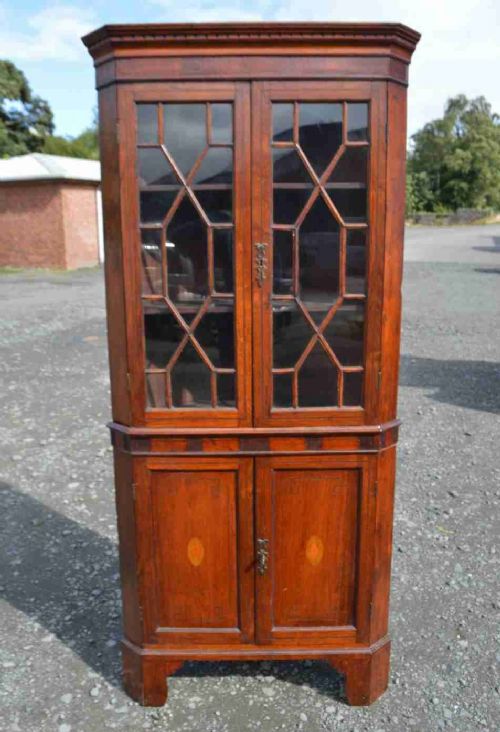 A Georgian Oak Corner Cabinet on Base
