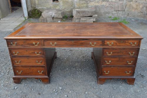 A Large Georgian Mahogany Partners Desk