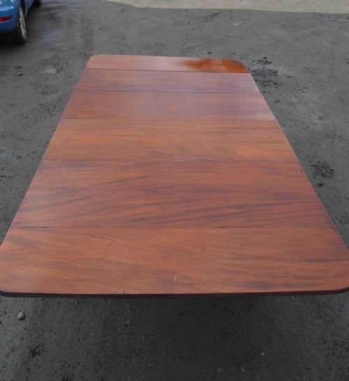 fig 1. A Late Georgian Drop leaf extending mahogany dining table