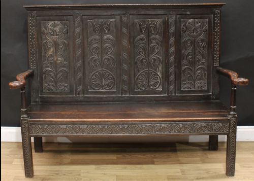 An 18th Century Oak Carved Wainscot Settle (Bench)