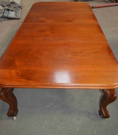 A Victorian Large Mahogany Extending Dining Table.