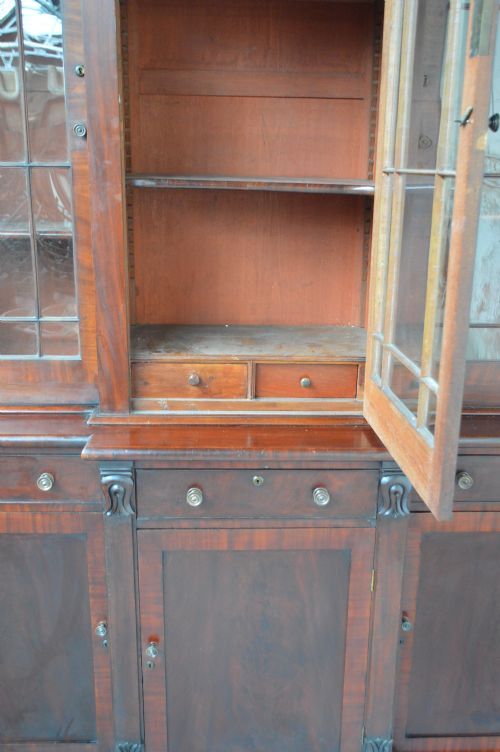 fig 2. A Regency period five-door astragal glazed triple breakfront mahogany bookcase