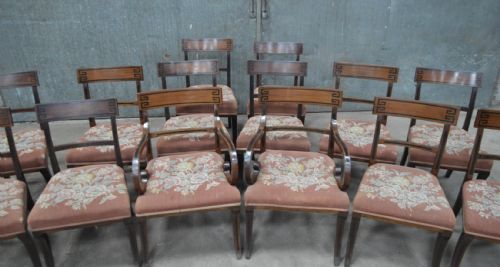 fig 1. Rare fine set of 14 Regency sabre legged mahogany dining chairs.
