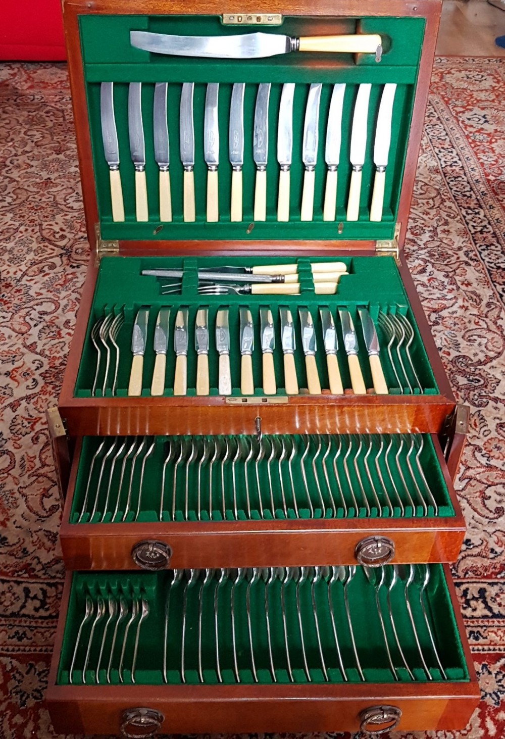 A good Mahogany cased canteen of cutlery. Bone handles