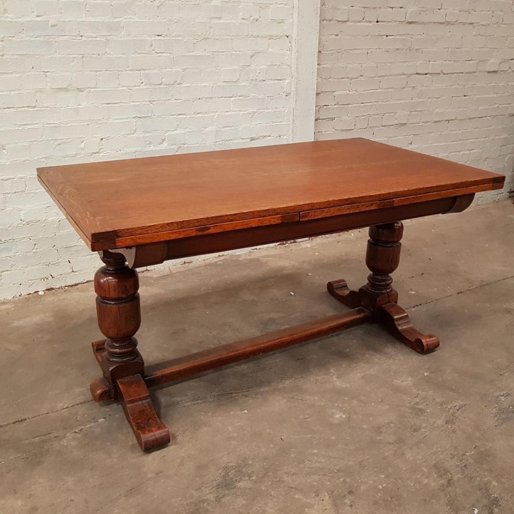 A 1920s Solid oak draw leaf refectory table. REDUCE BY 30%