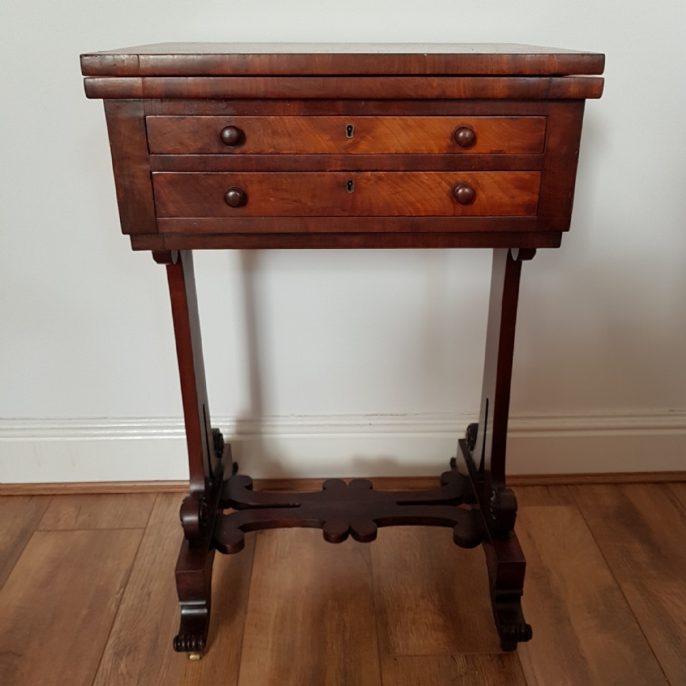 Early Victorian mahogany fold over card table.