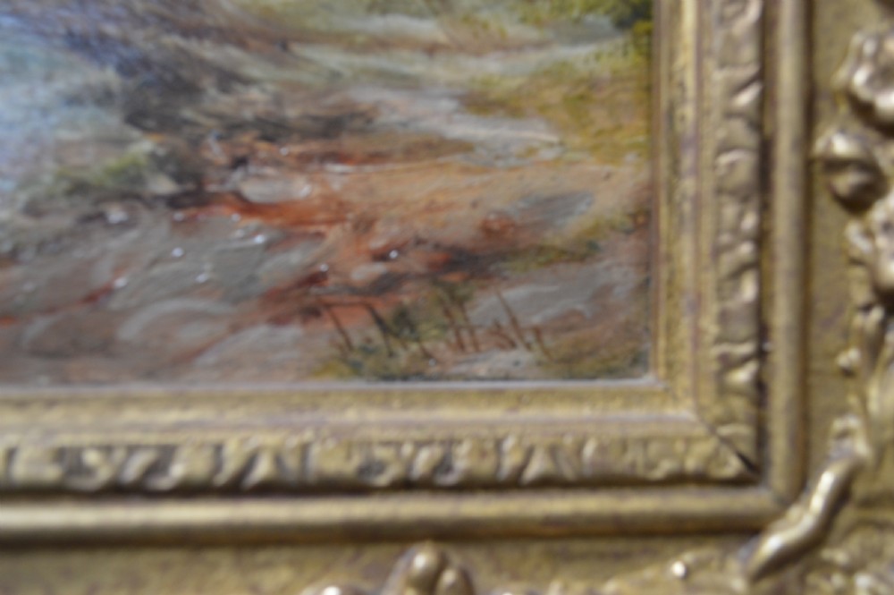 A Victorian landscape oil painting depicting a rocky mountain river scene enclosed within an ornate gilt wood frame. View III
