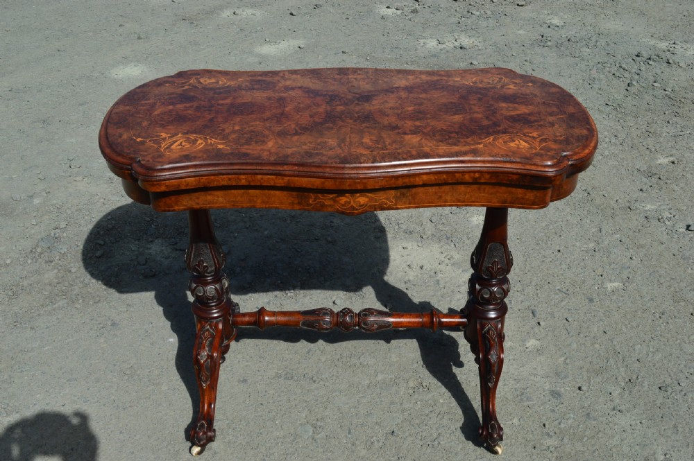 Victorian Burr walnut inlaid stretcher foldover games table 