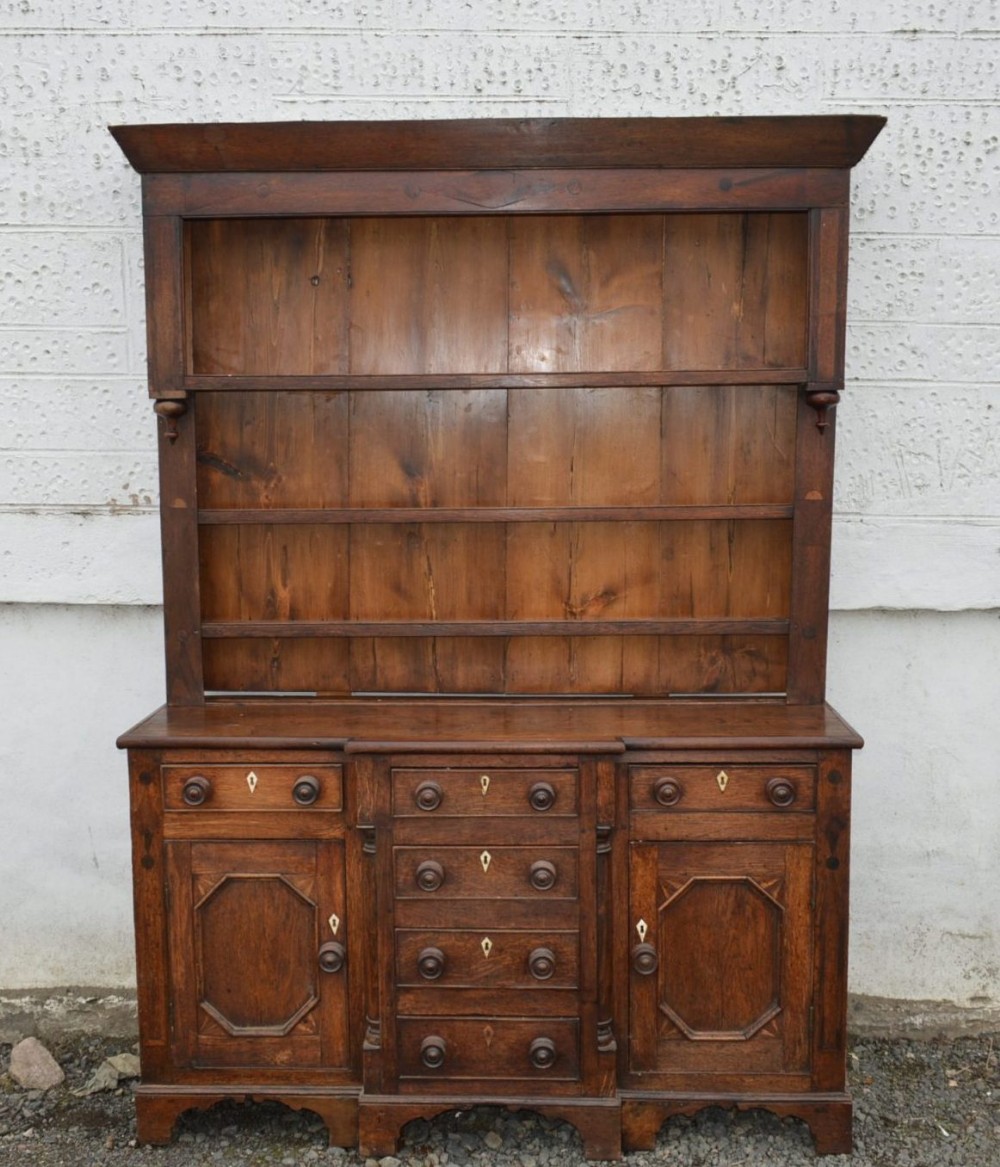 18th century oak inlaid dresser with plate rack.