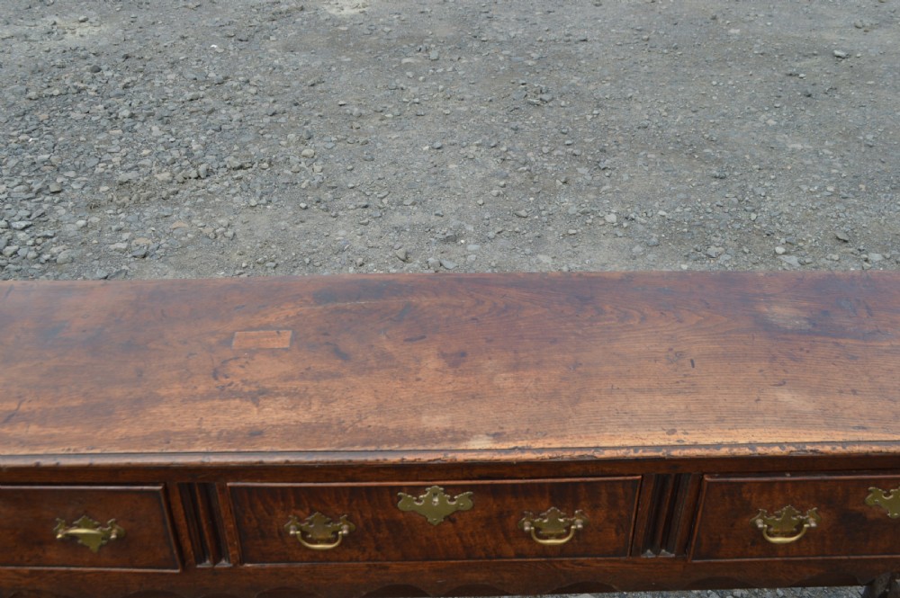 An 18th century oak bench dresser  View II