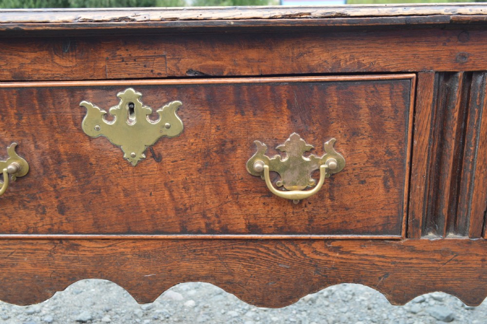 An 18th century oak bench dresser  View IV