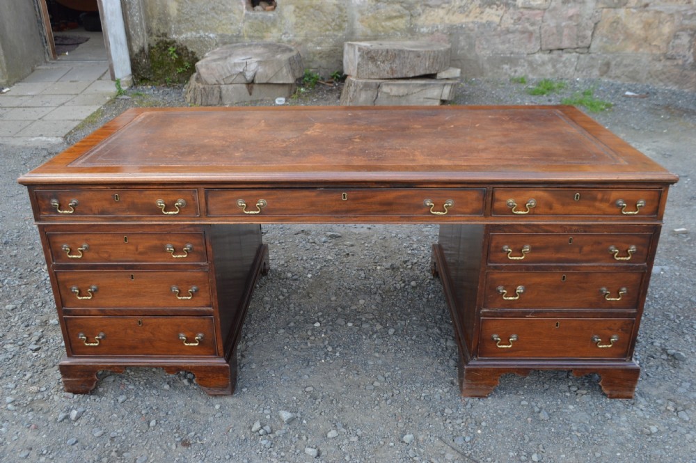 A large Georgian mahogany partners desk