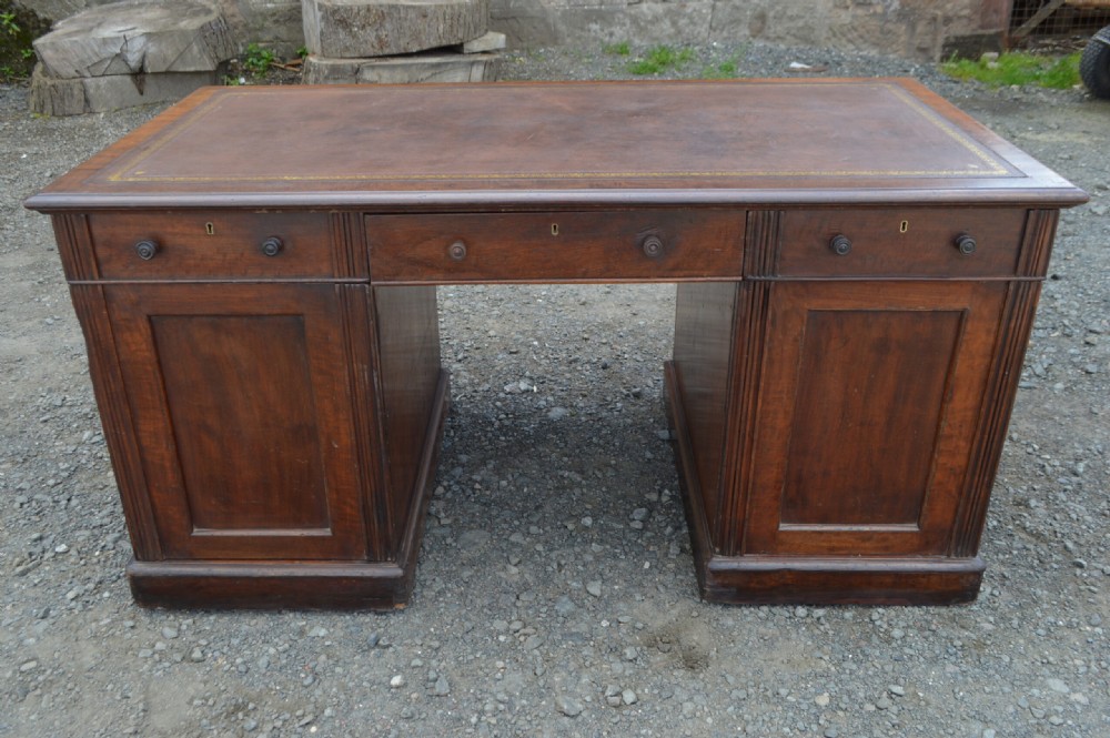 Early Victorian Mahogany Partners Desk.