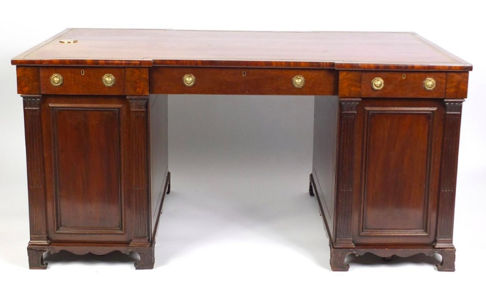 Early 19th-century inverted breakfront mahogany partners desk