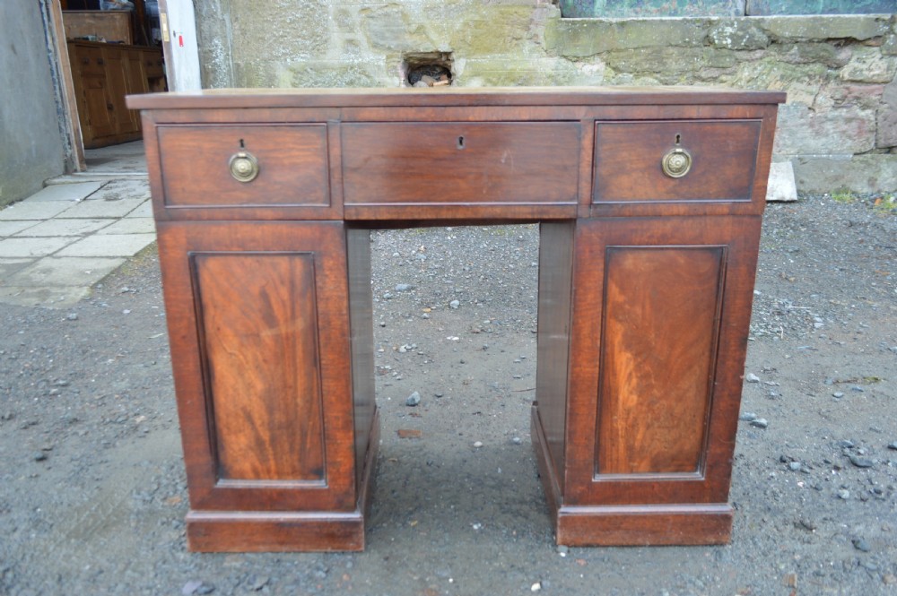 A small Regency mahogany writing desk