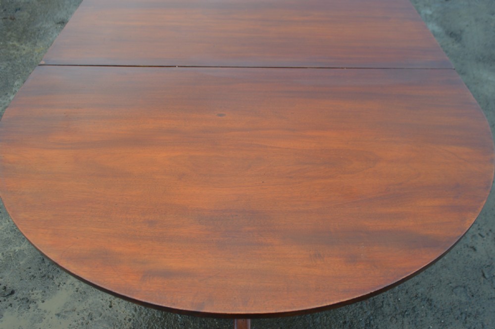large 18th century three pedestal mahogany dining table with 2 leaves. View III