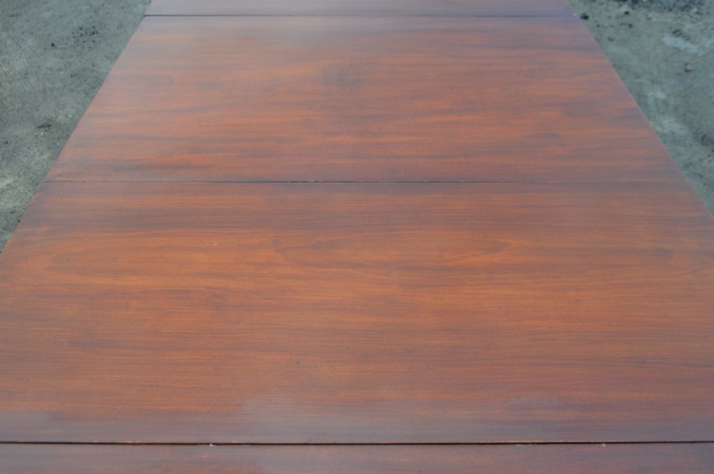 large 18th century three pedestal mahogany dining table with 2 leaves. View IV