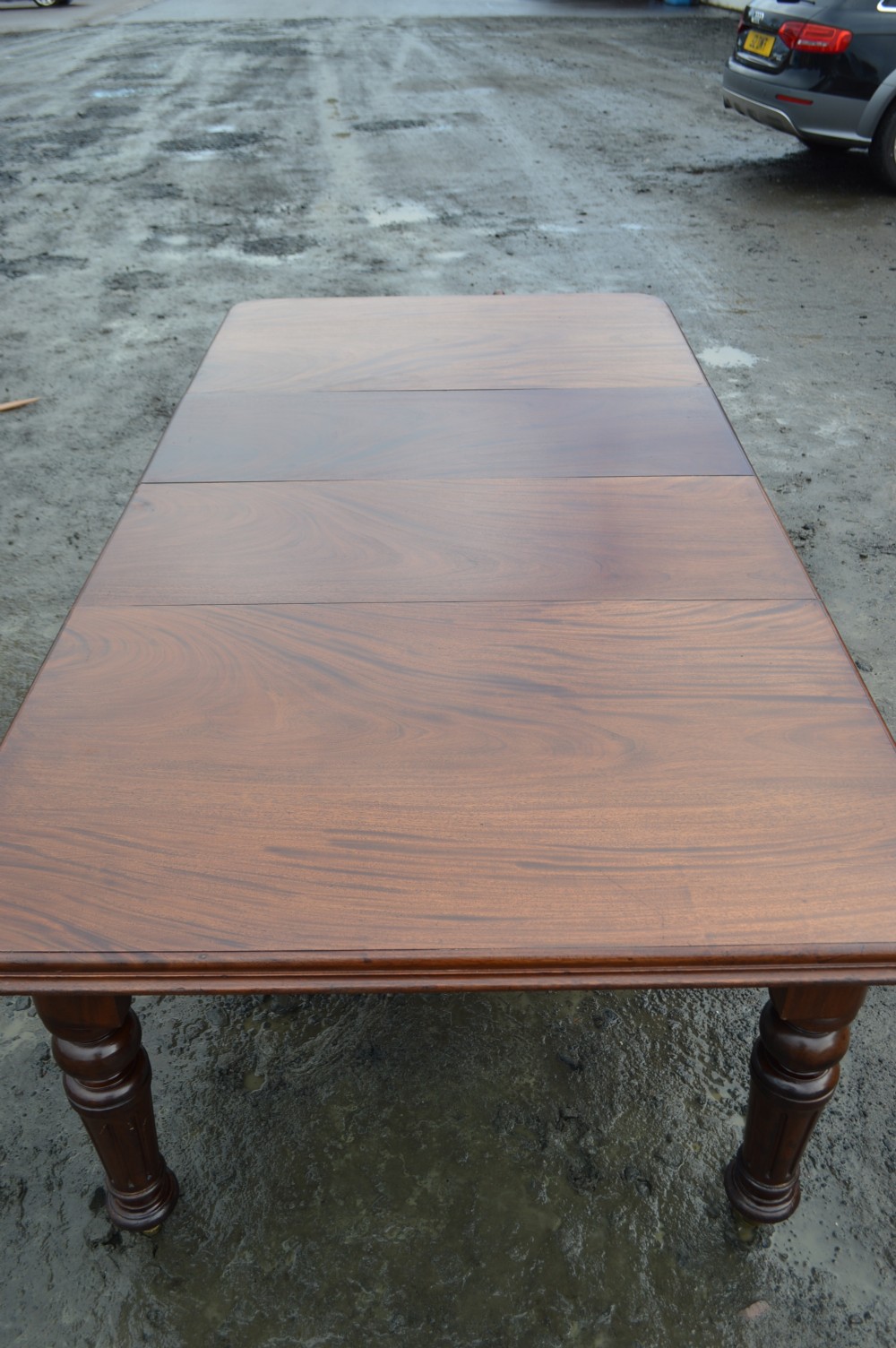 A Victorian top quality mahogany windout dining table View II