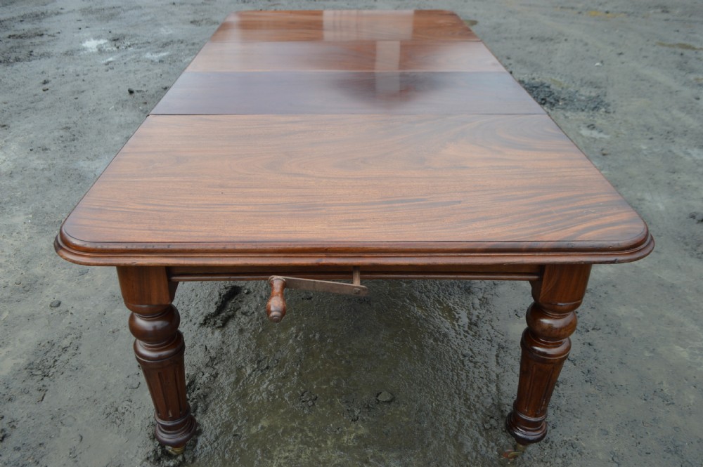 A Victorian top quality mahogany windout dining table View III