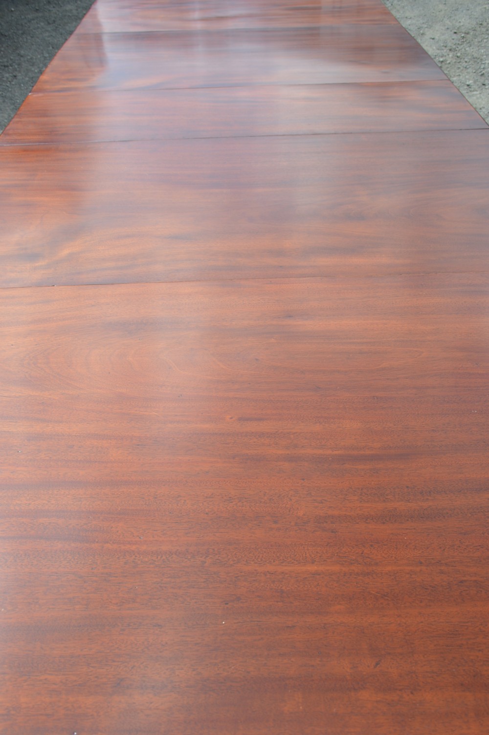 A good early Victorian extending mahogany dining table View III