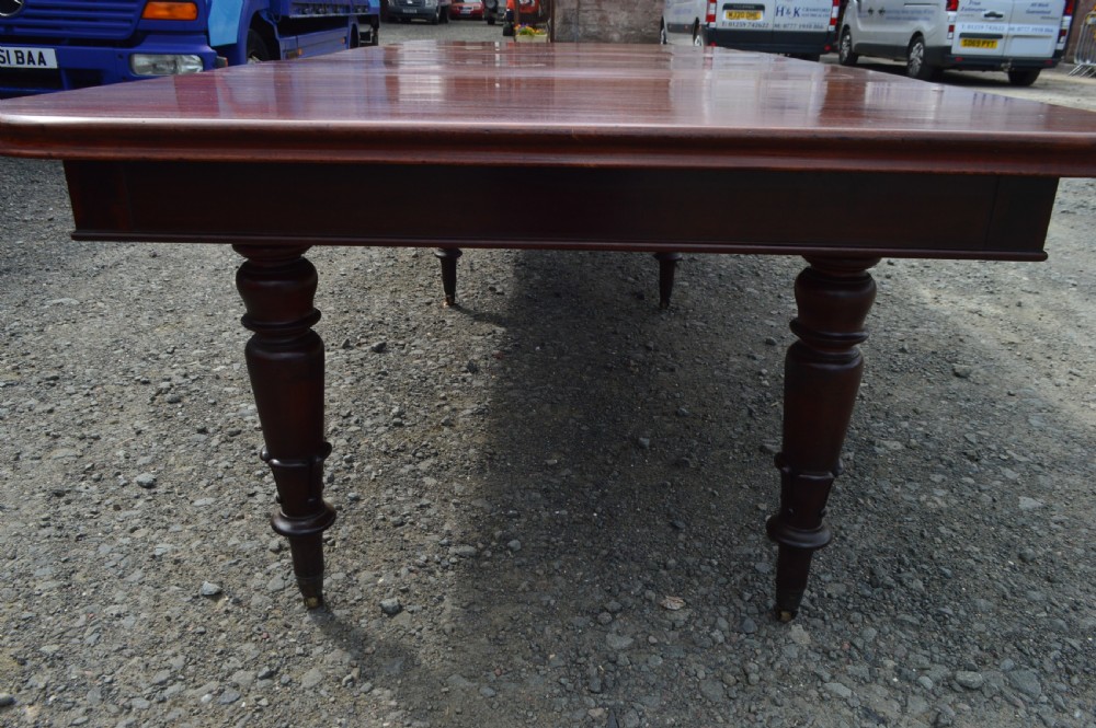 A good early Victorian extending mahogany dining table View IV
