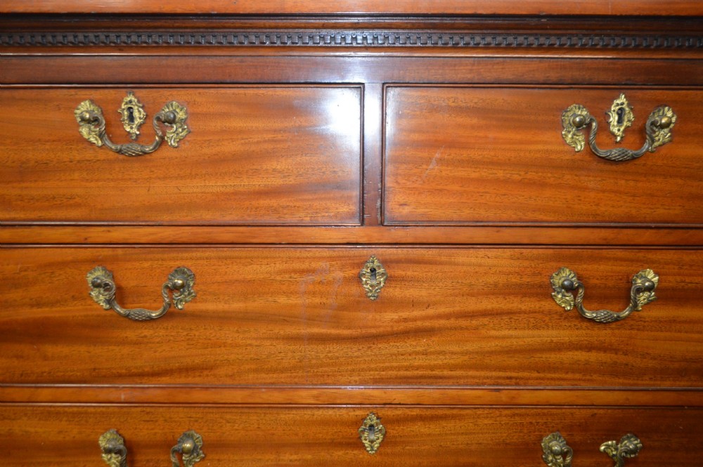 An antique Georgian mahogany chest-on-chest featuring two short drawers over six long graduated drawers with brass swan-neck handles and bracket feet. View III