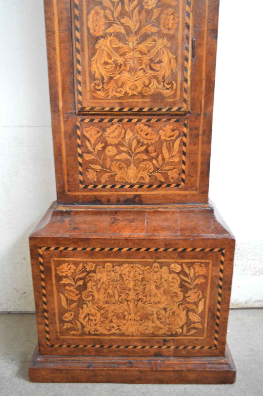 A good  marquetry long case clock. Circa 1725 View V