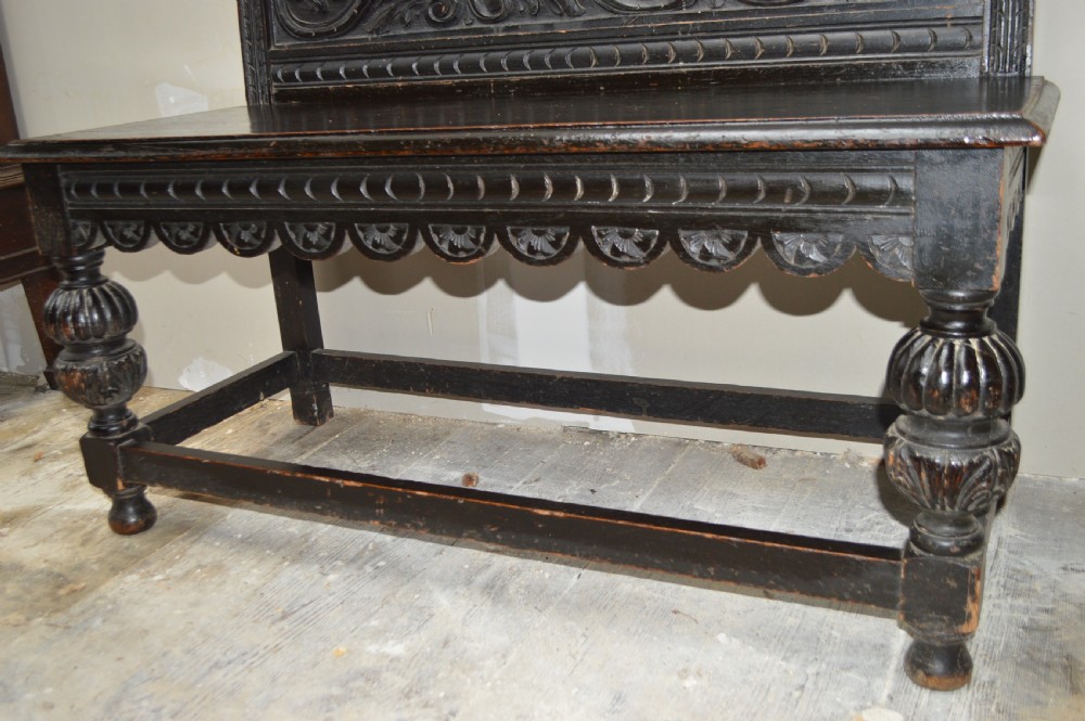 A 19th century carved oak hall bench View III