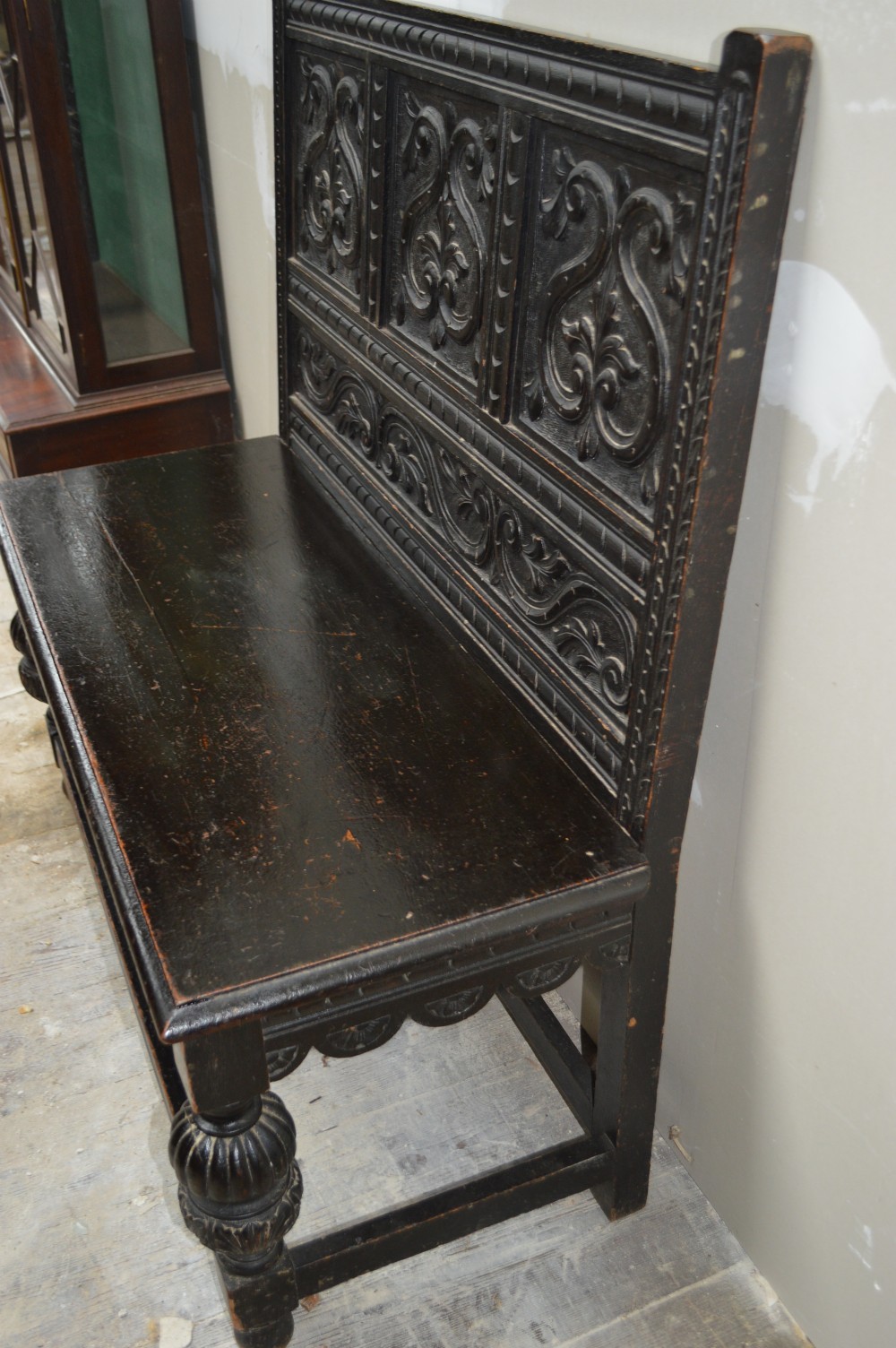 A 19th century carved oak hall bench View IV
