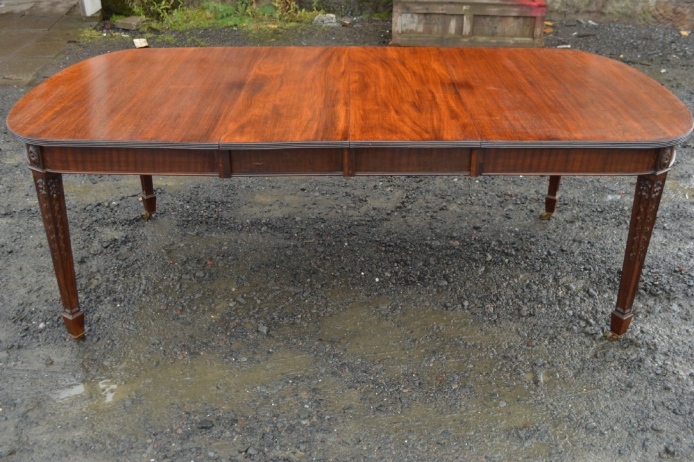 A Edwardian Robert Adam revival extending dining table View VI