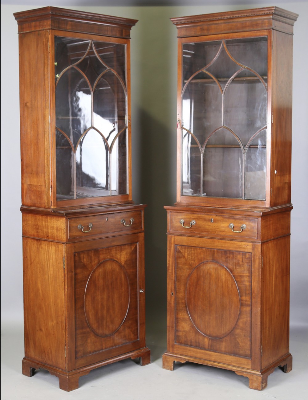 A pair of 19th century mahogany library bookcase cabinets
