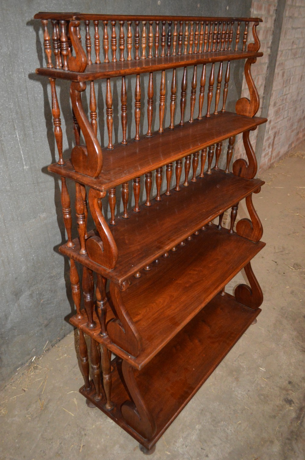 A Victorian mahogany waterfall open bookcase. View II