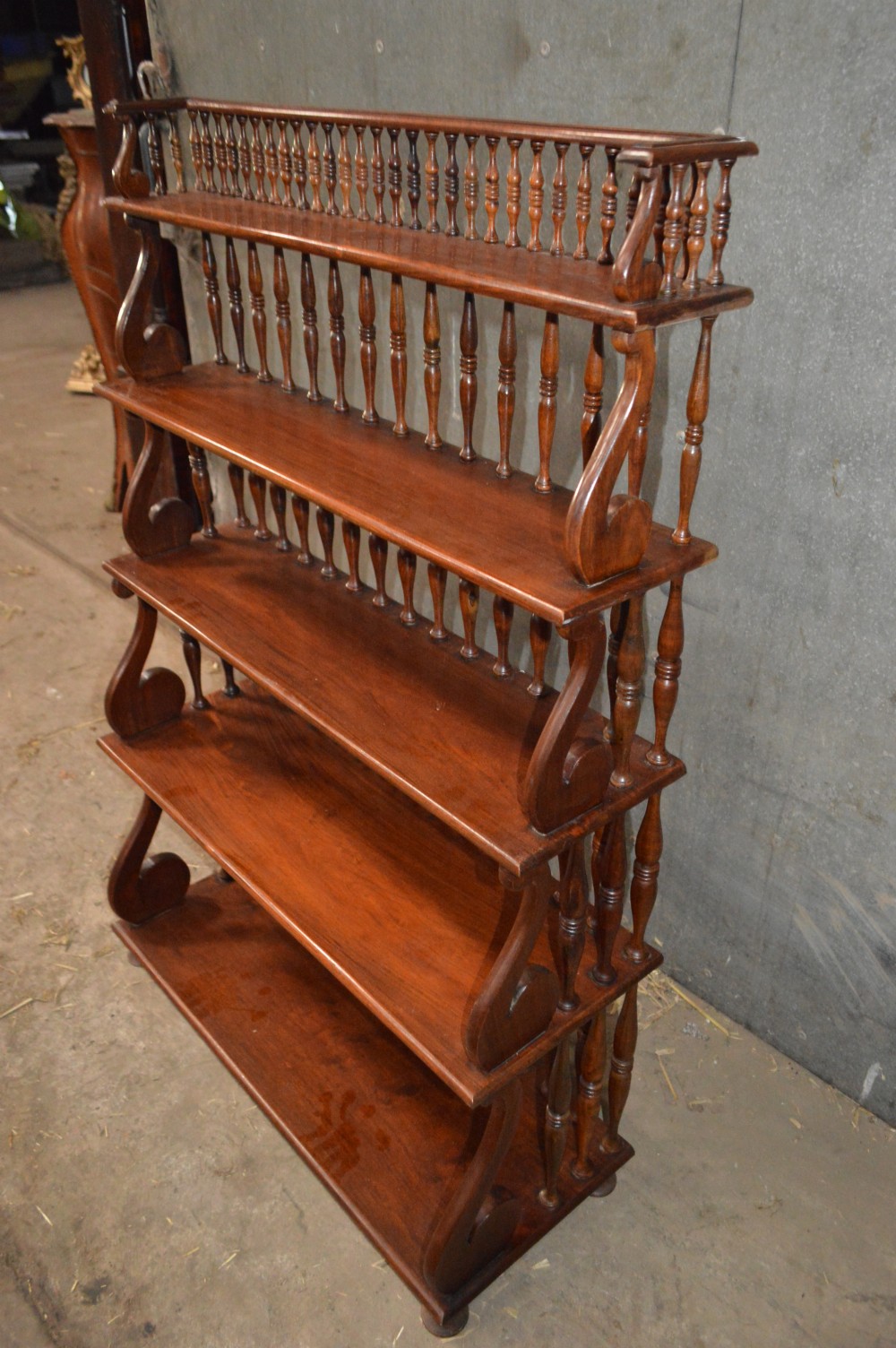 A Victorian mahogany waterfall open bookcase. View III