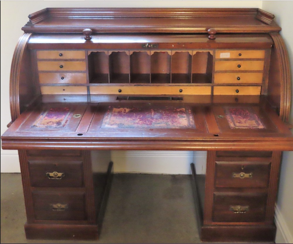 A Victorian mahogany cylinder desk.