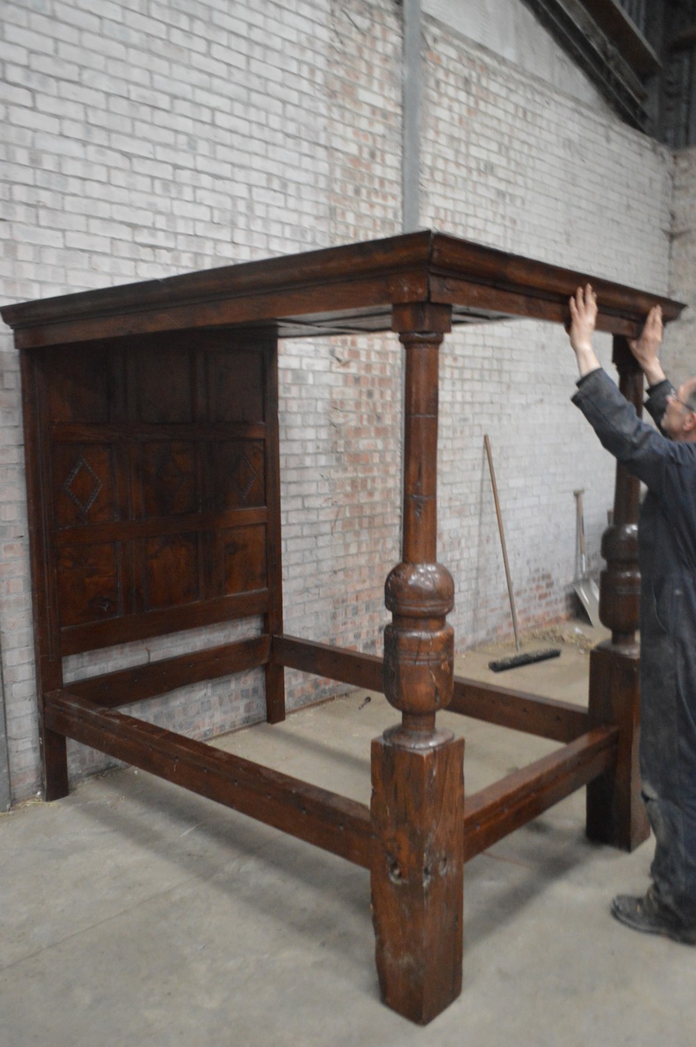 A Charles II Oak four poster bed.