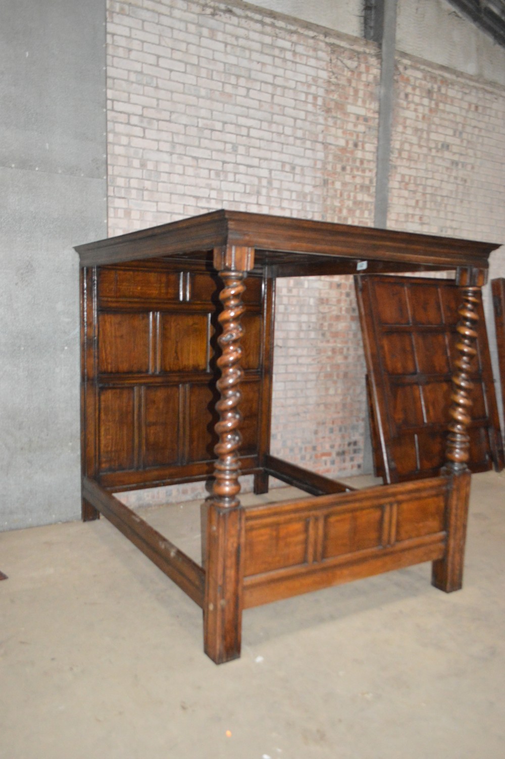 A Victorian Oak four poster bed