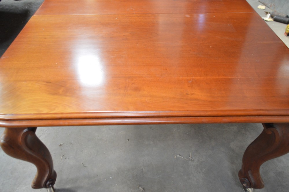 A Victorian Large mahogany extending dining table. View IV