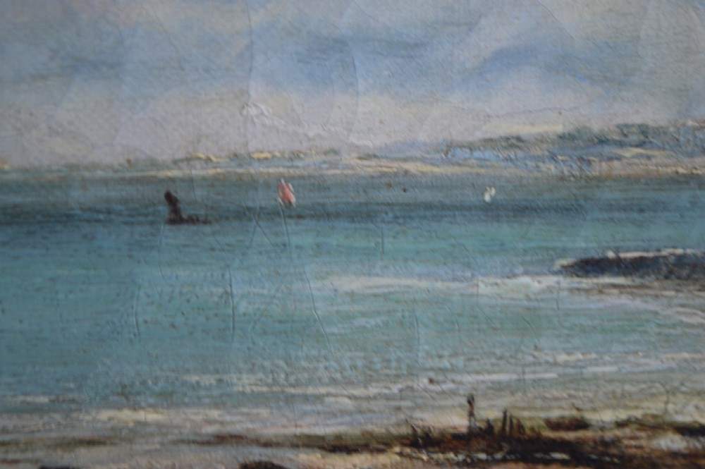 A 19th-century coastal oil painting depicting figures on a beach near cliffs, housed in an ornate giltwood frame. View IV