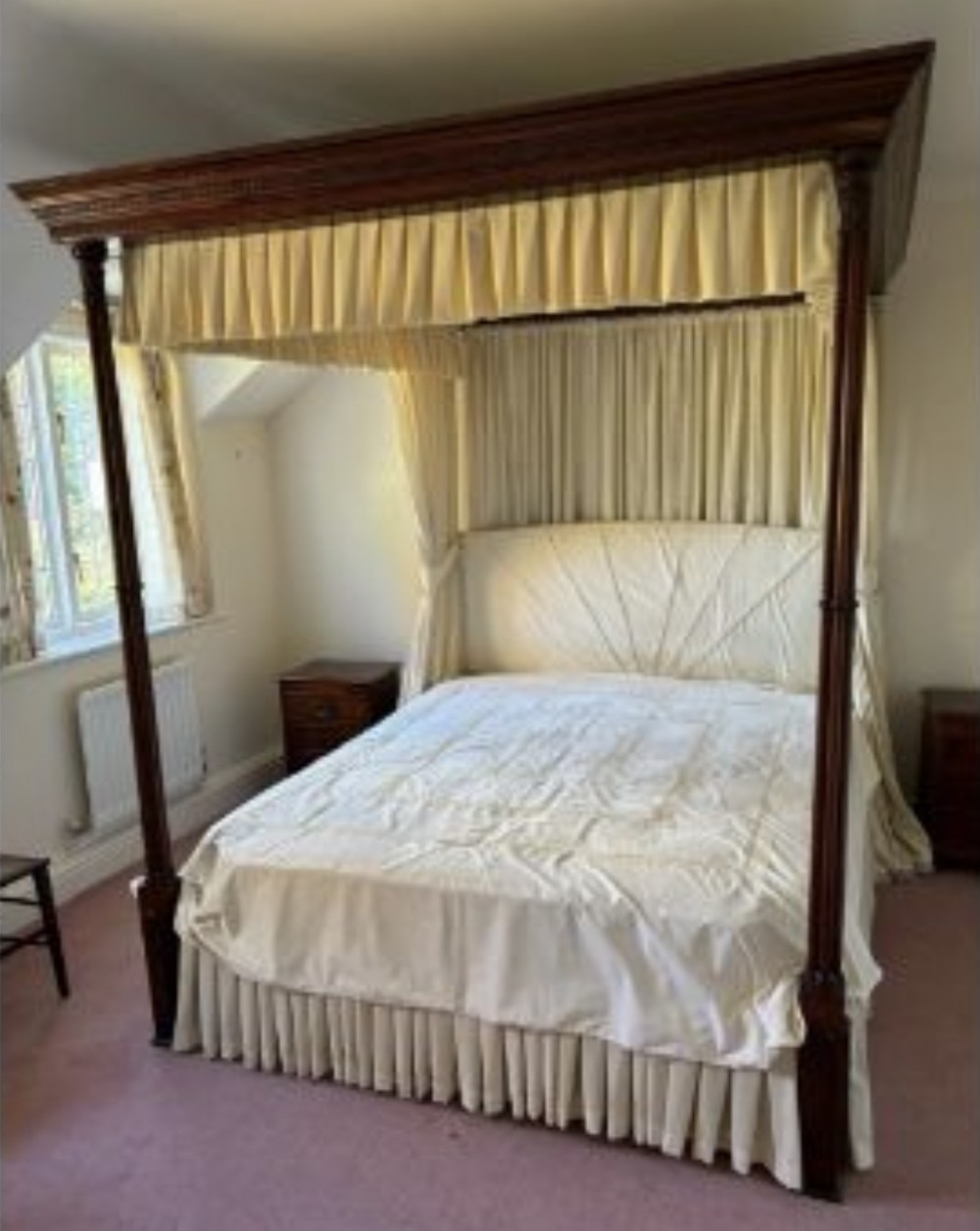 A George III mahogany four poster bed