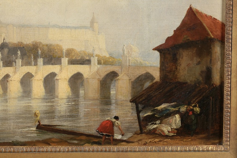 An 1830s English oil painting depicting the Charles Bridge and Prague Castle across a river, set within a gilded fluted frame. View IV