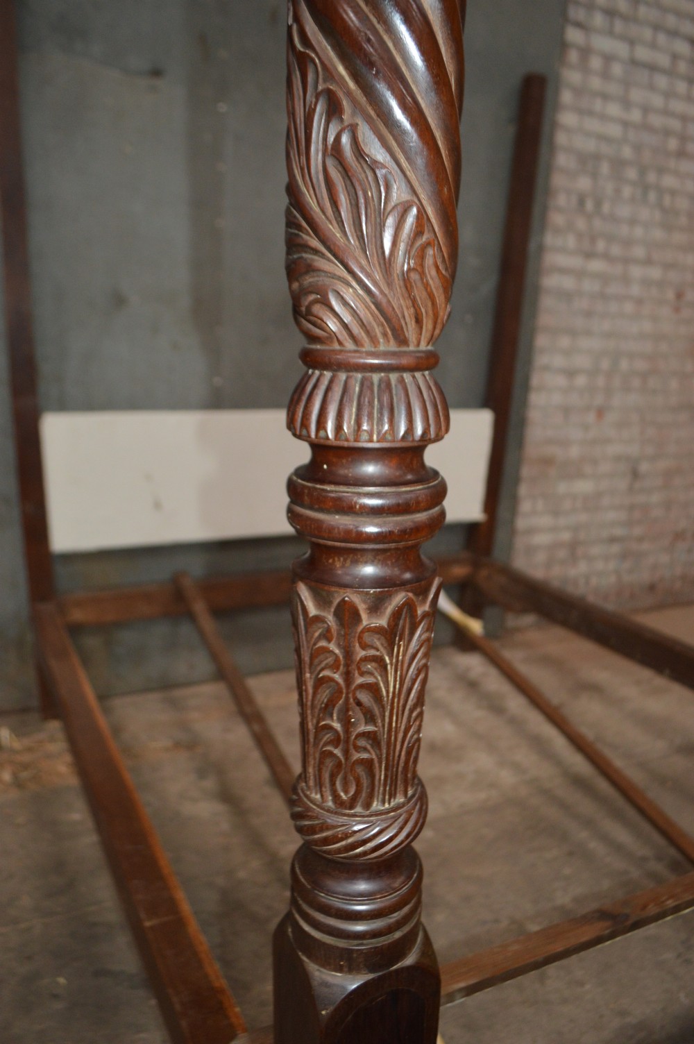 A dark mahogany Georgian four-poster bed frame featuring carved spiral-twist foot posts and a plain headboard panel. View III