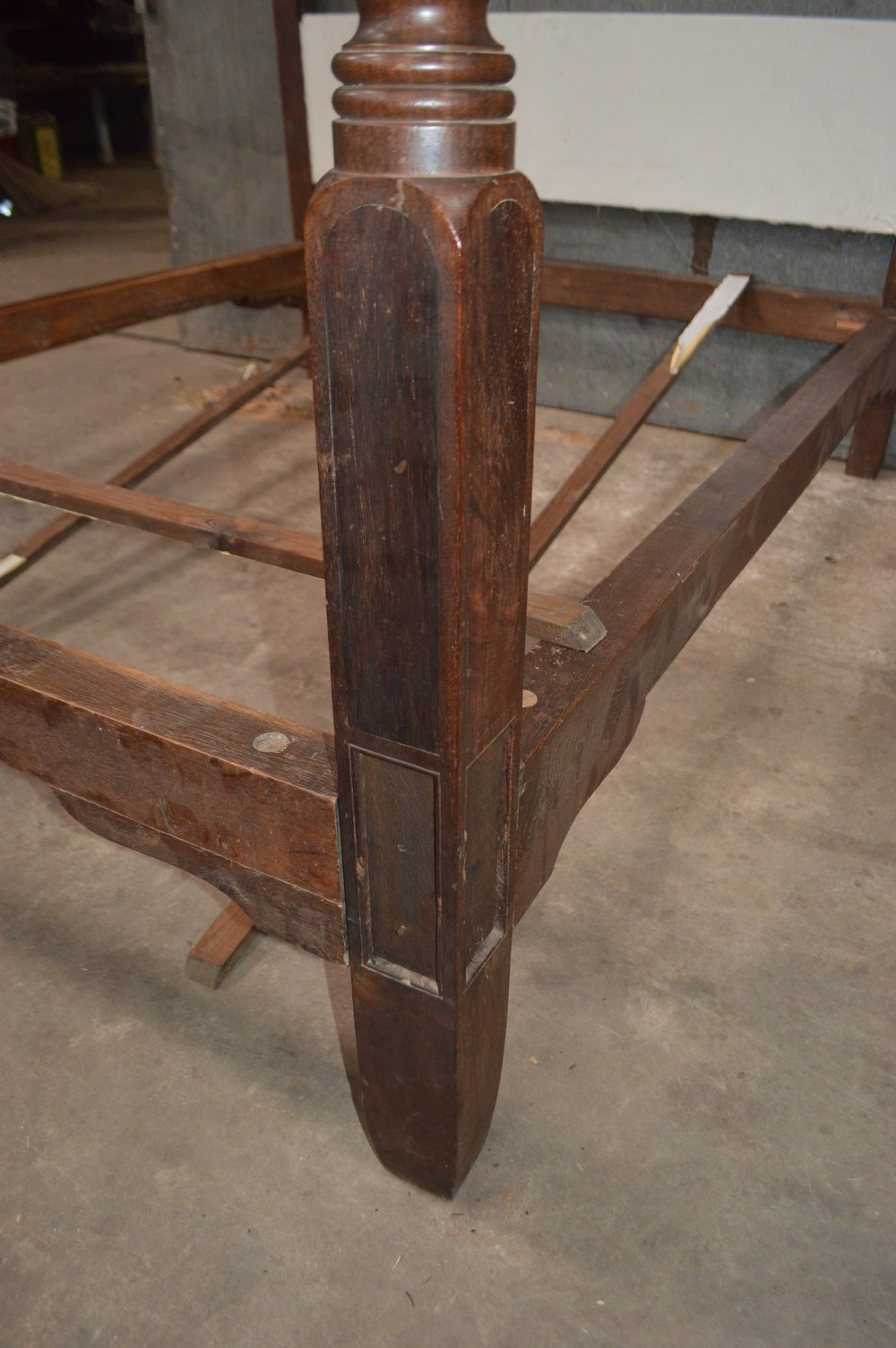 A dark mahogany Georgian four-poster bed frame featuring carved spiral-twist foot posts and a plain headboard panel. View IV