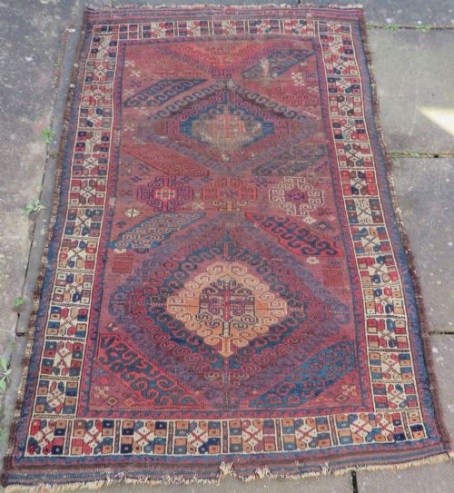 Distressed Antique Khamseh Rug. South West Persia. 168cm X 112cm.
